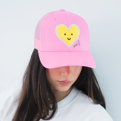 Find the Yellow Trucker Hat – Pink
